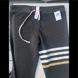 NWT-Sundry Sweatpants with white and gold stripes